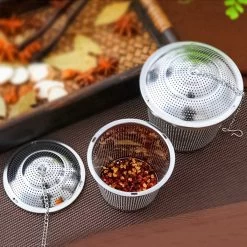 TeaLux 5-Delig RVS Theefilters Set Met Maatlepel En Lekbakjes En Knijper - Theezeef Voor Losse Thee En Kruiden - Tea InfuserStrainer Giftset - Verse Thee FilterZeef Cadeau Pakket - Kruidenbuiltje Ei Met Onderzetters - Geschenkset -Koffie en Thee Verkoop 1200x1200 299